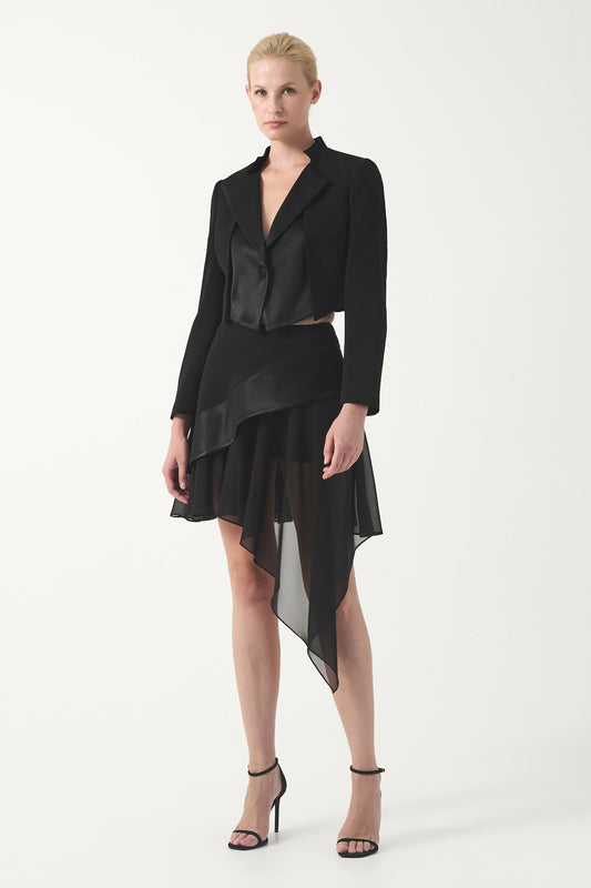 Cropped jacket with an asymmetric layered skirt