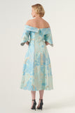 Cape detail sleeve A-line midi length patterned jacquard dress
