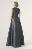 Square collar, ribbon accents, and flap pocket details vest with A-line long skirt
