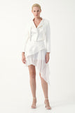 Cropped jacket with an asymmetric layered skirt