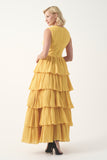 Sleeveless circle neckline with a fitted pleated bodice and layered pleated gown